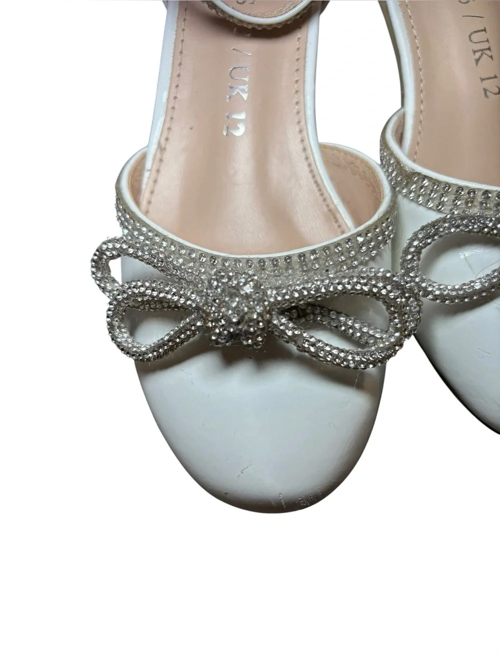Embellished White Ankle-Strap Flats with Crystal Bow